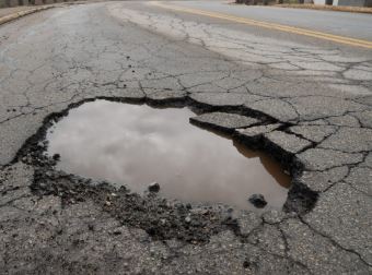 Pothole in asphalt road